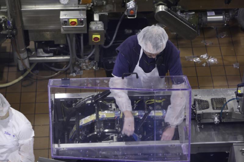 2011-03-25 15:49:42 ** Tillamook Cheese Factory ** Some of the foil got stuck in the packaging machine.