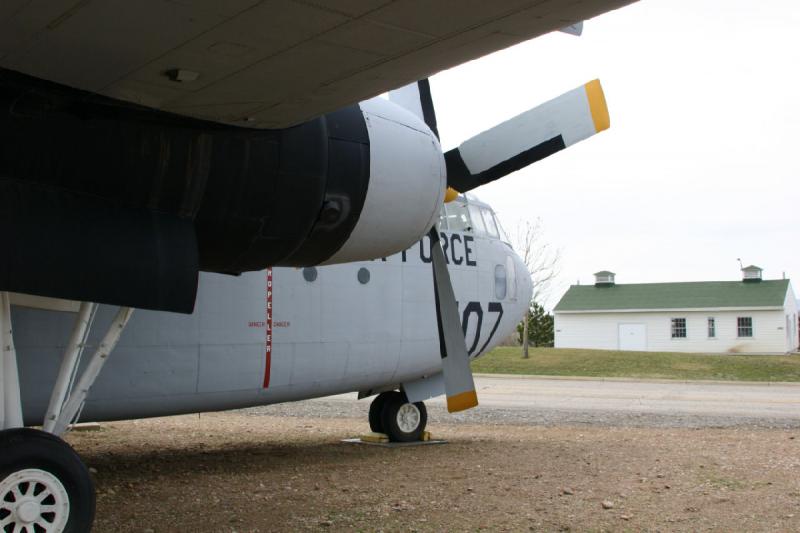 2007-04-01 14:42:58 ** Air Force, Hill AFB, Utah ** Below the wing of the C-119G. The nickname 'Flying Boxcar' was picked because the plane had a capacity of roughly 93% of a railroad boxcar.