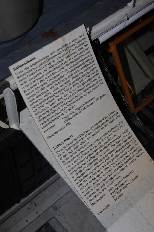 2010-04-15 15:39:26 ** Bremerhaven, Germany, Submarines, Type XXI, U 2540 ** Battery rooms

Through the cut open deck you can see one of the 3 battery rooms. Each contains 2 x 62 accumulator cells with a weight of 620 kg each which are installed on two decks and connected with each other. These cells enabled the submarine to remain submerged for 1 hour and 8 minutes at a speed of 17.2 kn. The cruising duration at silent speed under water was 50 hours. The battery has a voltage of 149 volts with an output of 6267 to 12150 Ah depending on current. The battery has to be recharged directly after being completely discharged, after partial discharge within on week. An ordinary charge starts with 2040 ampere up to 2.4 volts per accumulator cell = 149 volt per partial battery. With a constant current voltage the current is gradually reduced to 510 ampere. When a current intensity of 510 ampere and 149 volts is reached, recharging is concluded and the battery charged to capacity. Recharging takes approximately 15 to 20 hours.

Manufacturer: Varta, Hagen in Westphalia
3 partial batteries 2 x 62 cells each = 372 cells
total weight: 230 tons