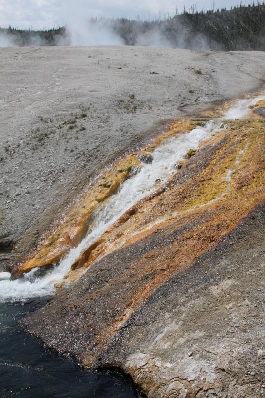 2009-08-03 11:18:52 ** Yellowstone National Park ** The hot water from the geysers flows into the Firehole River.